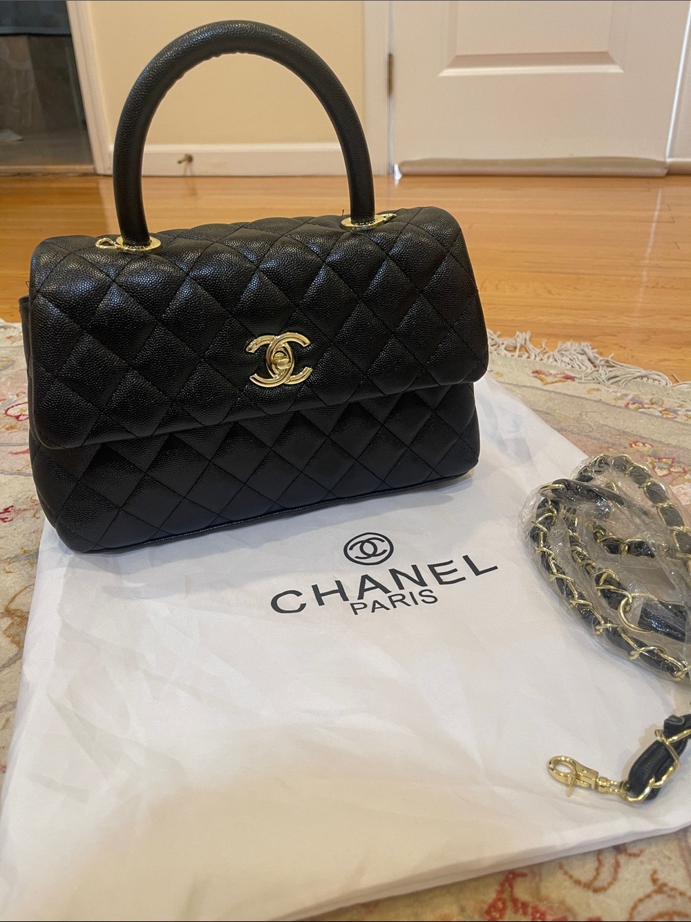 Black Quilted Top Handle Shoulder Bag with Gold Hardware